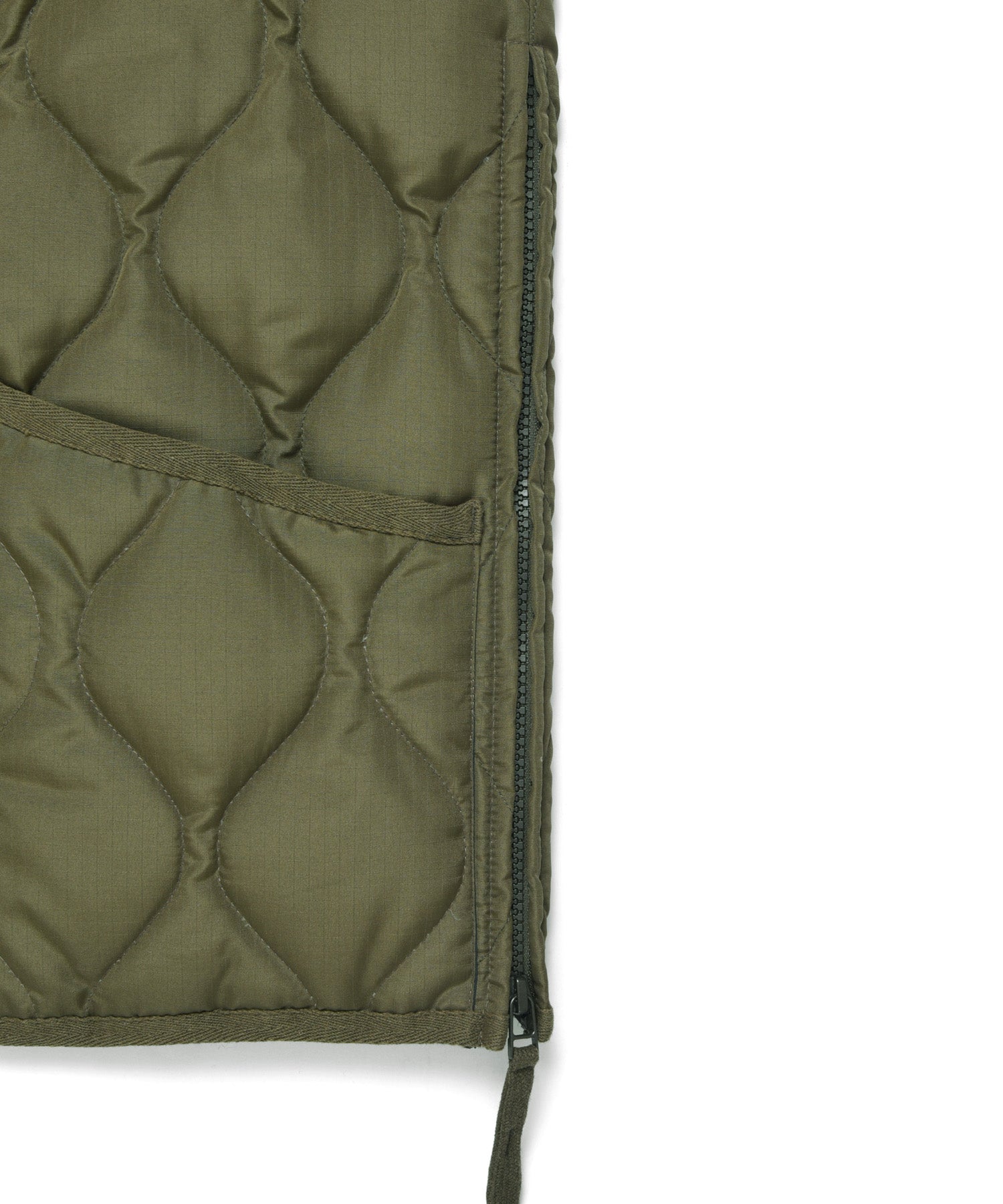 Close-up of the side zip slit on the TAION Unisex Military W-Zip Down Vest in Olive