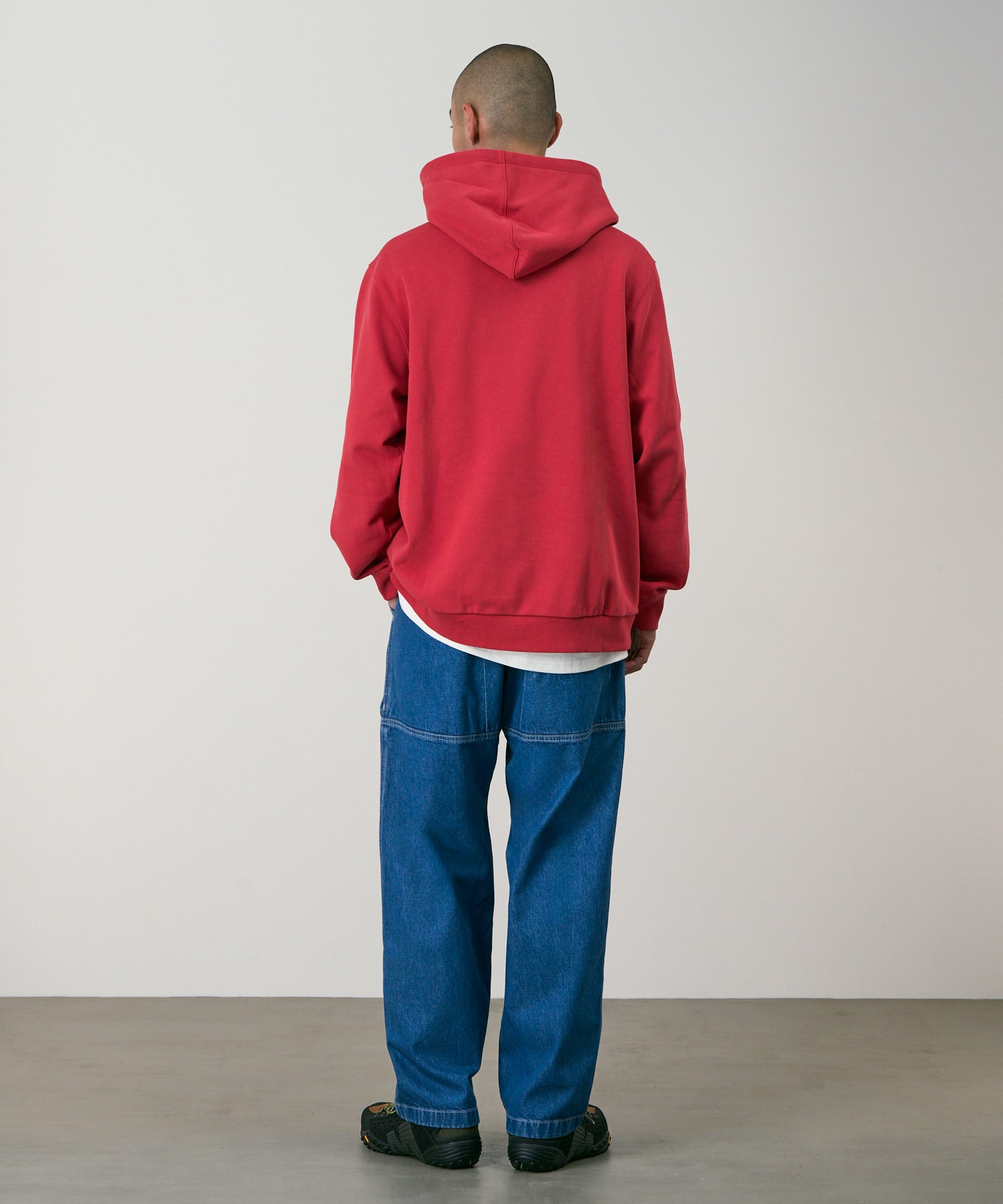 Lifestyle view of model wearing Denim EQT Pant in Light Wash