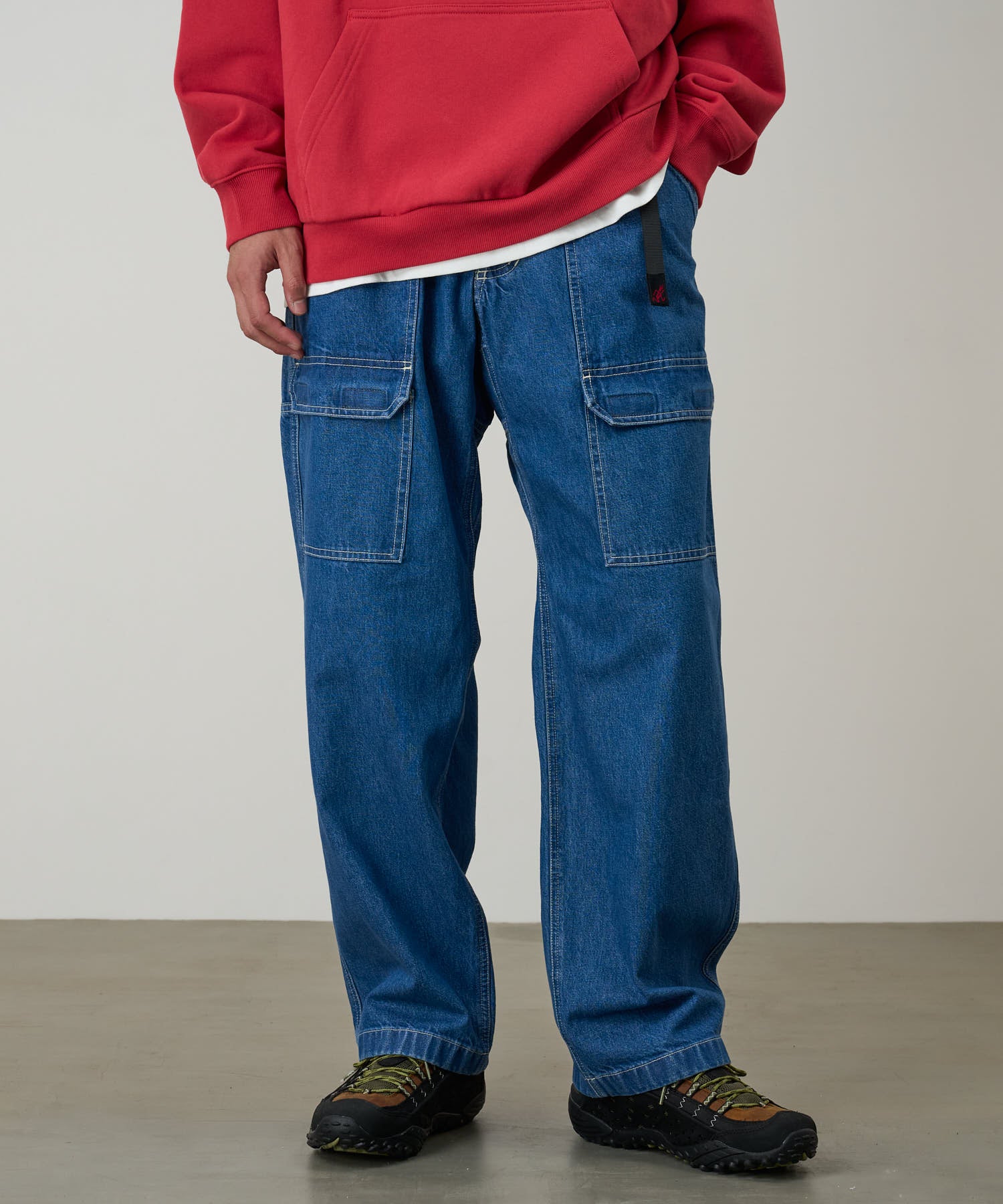 Model wearing Denim EQT Pant in Light Wash