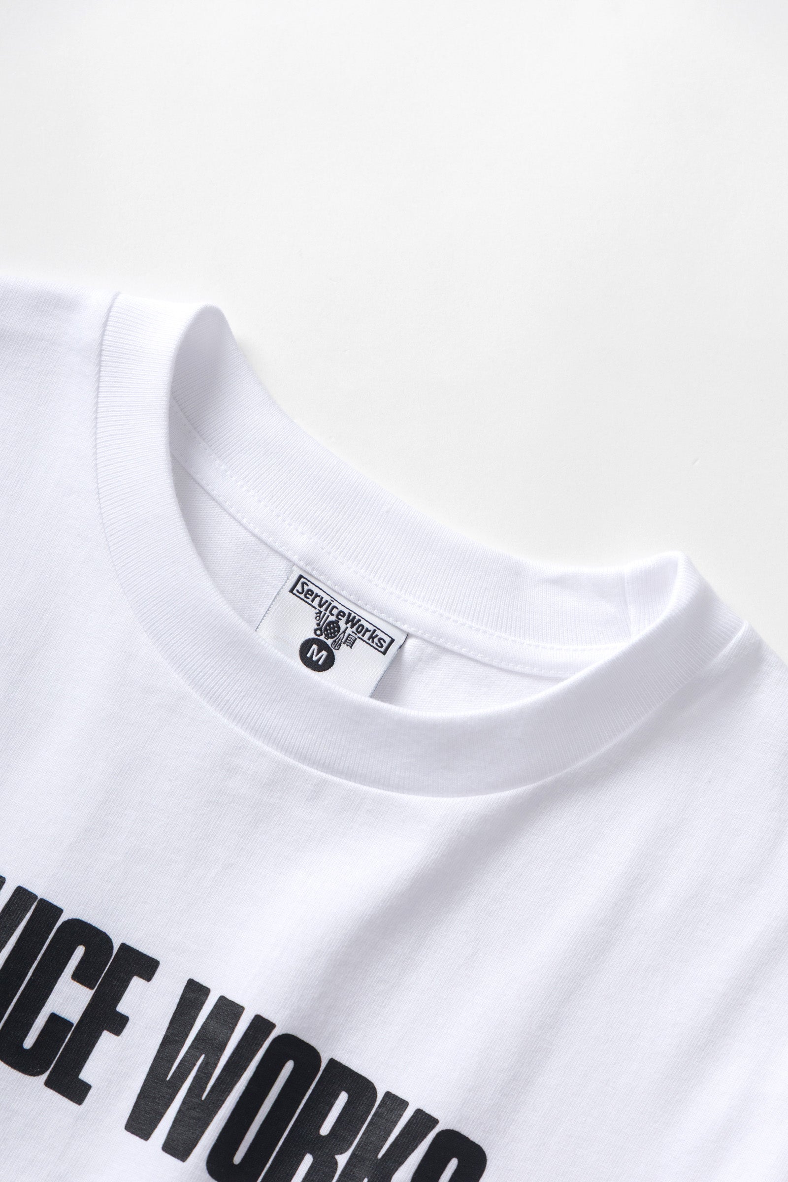 LE.SHOP Garden Tee White streetwear t-shirt angled side view in white