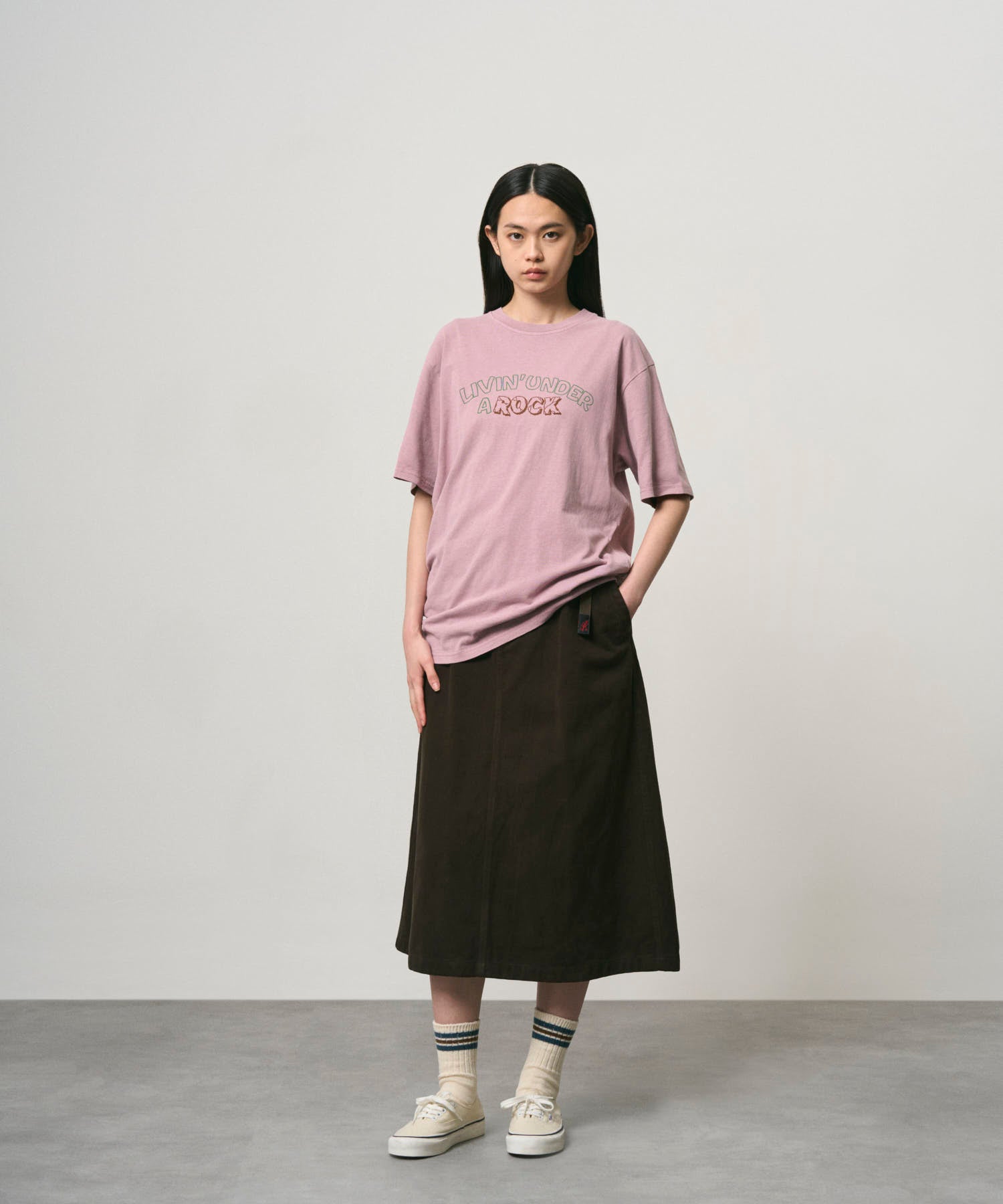 Woman wearing Gramicci Livin Tee Lilac Pigment premium cotton T-shirt