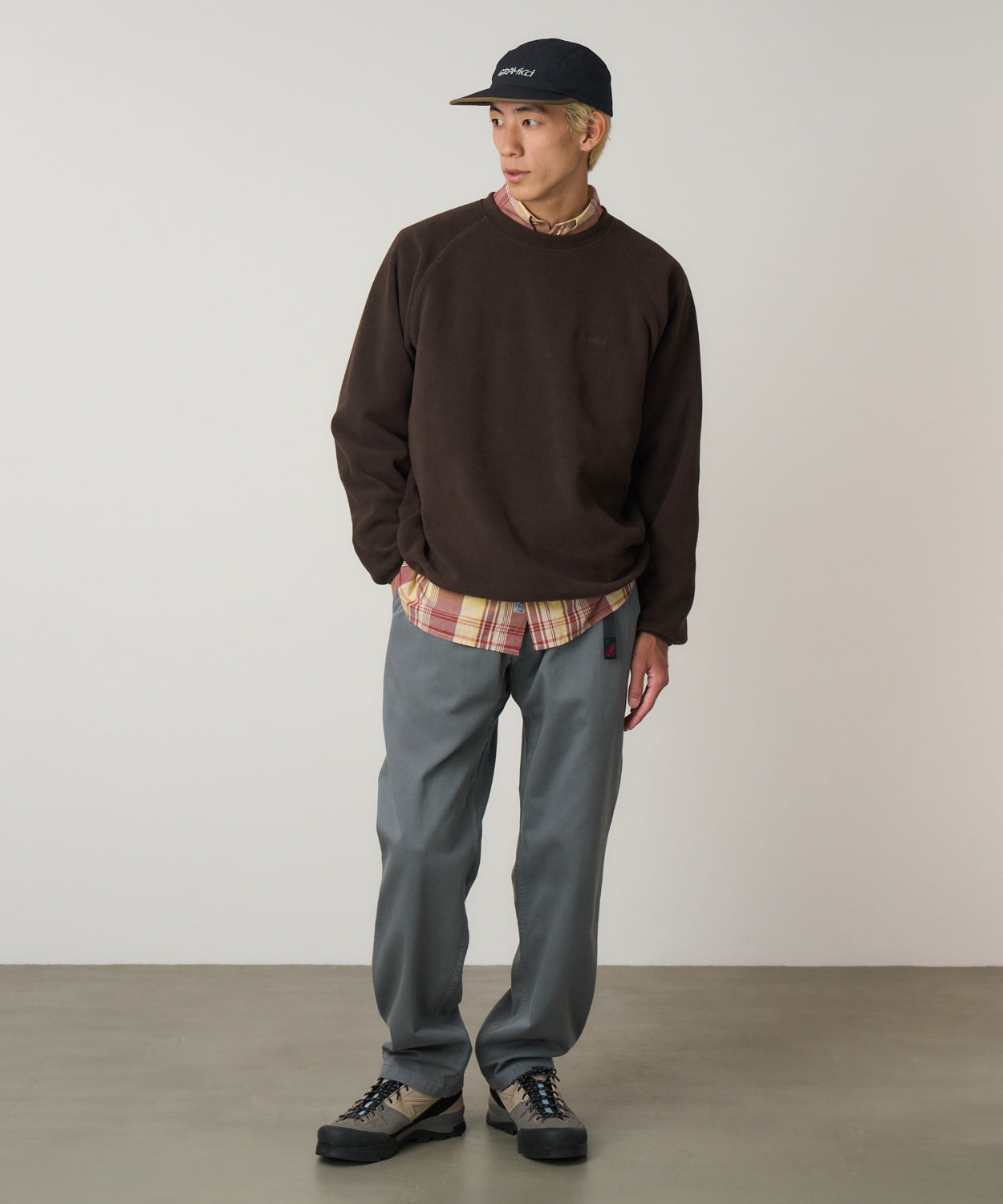 Man wearing Gramicci Seal cotton twill pants with relaxed fit