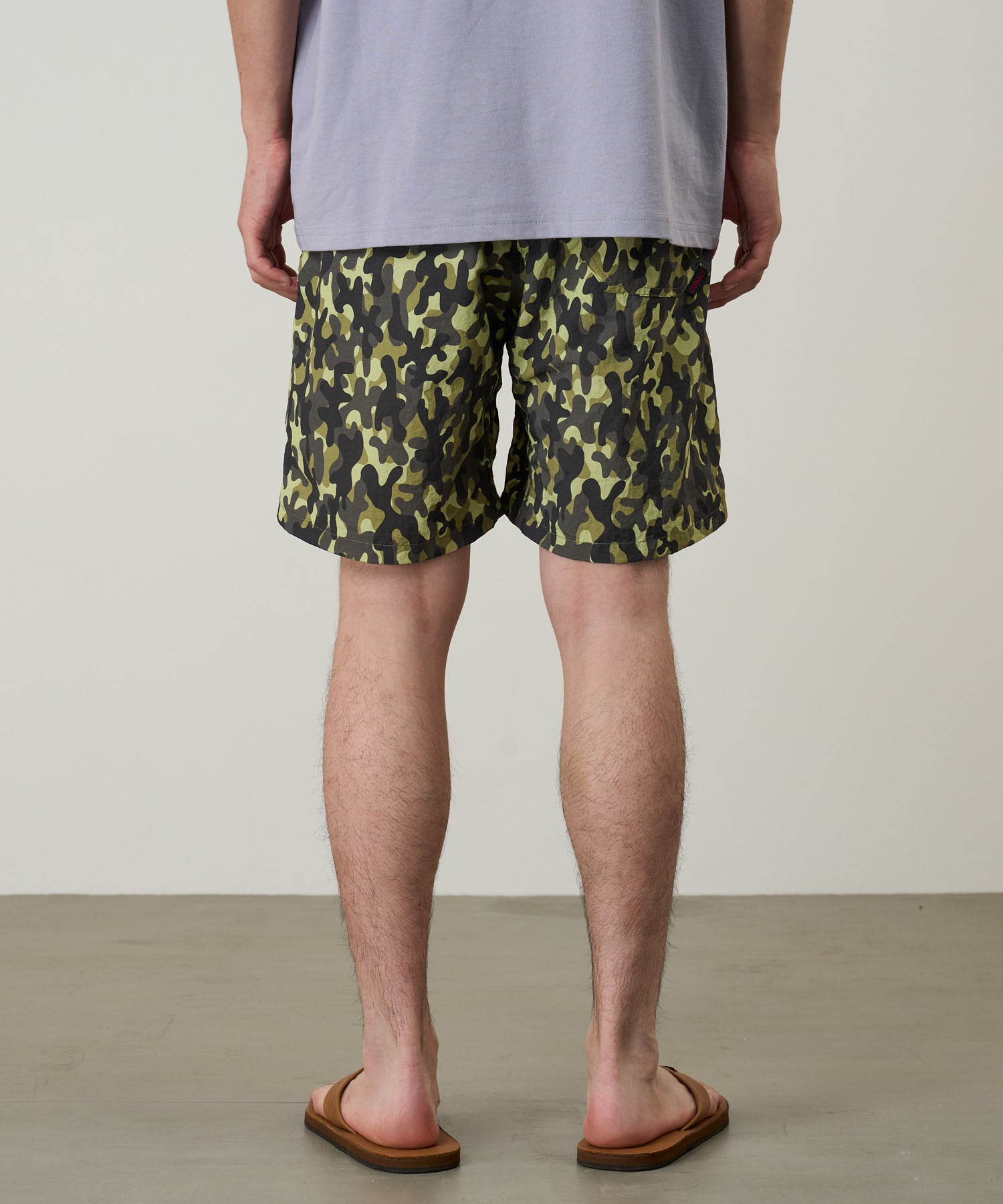 LE.SHOP Nylon Reef Shorts Olive Camo utility swim shorts worn side view on model fit streetwear styling