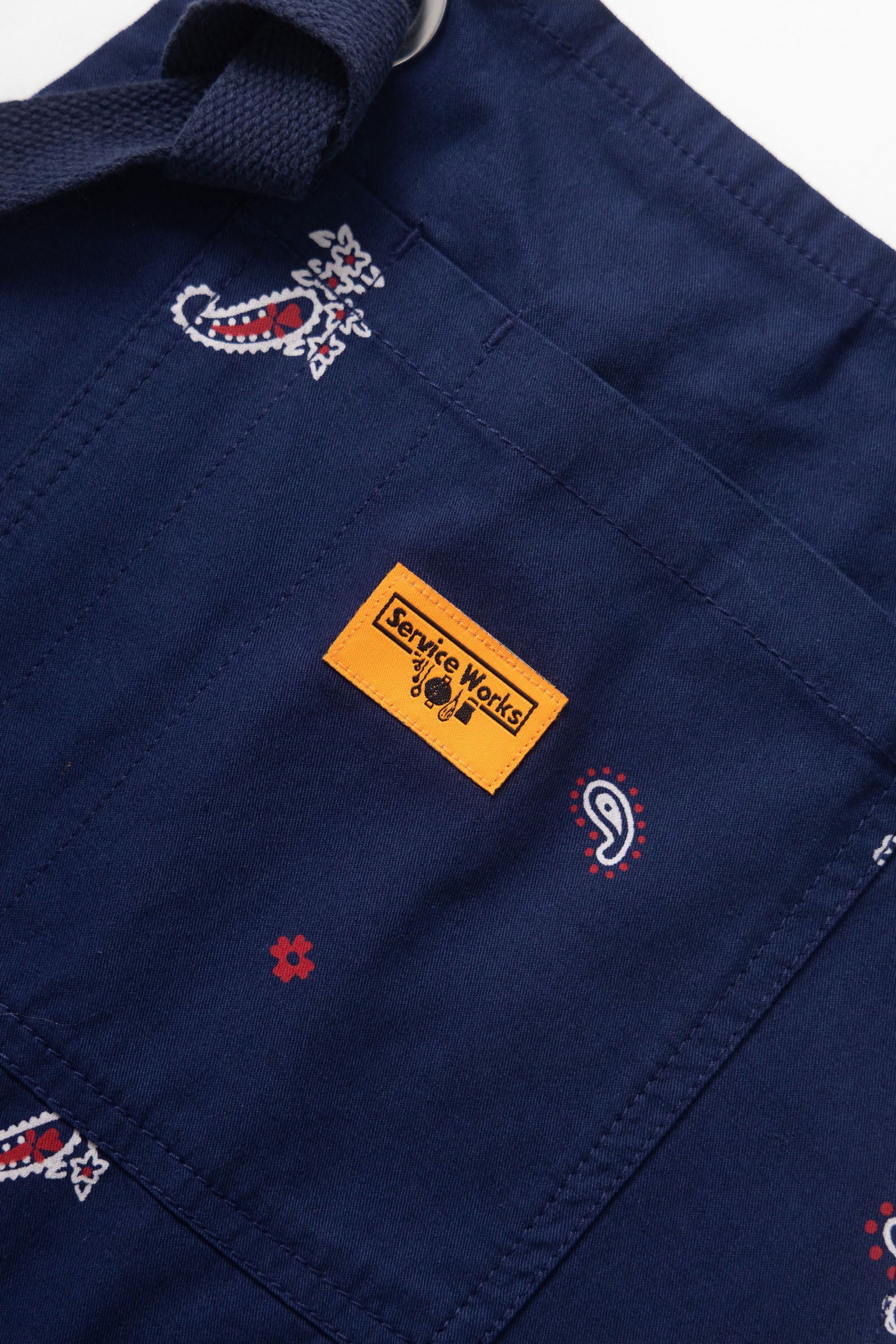 Royal paisley apron lifestyle view premium workwear apron for chefs baristas and creatives worn fit