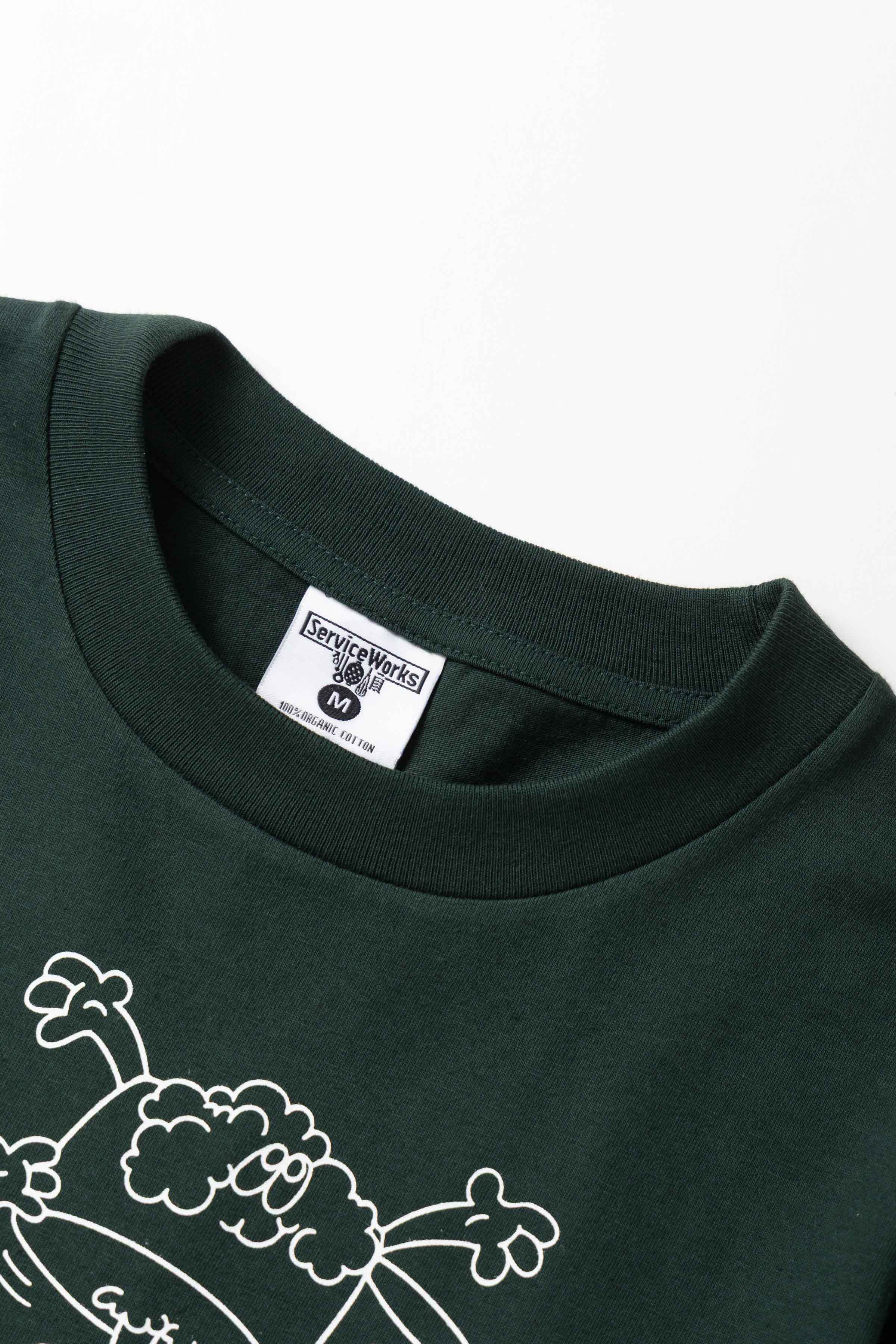 Model wearing forest Pots & Pans Tee shown from back featuring organic cotton fabric, clean silhouette and relaxed streetwear fit