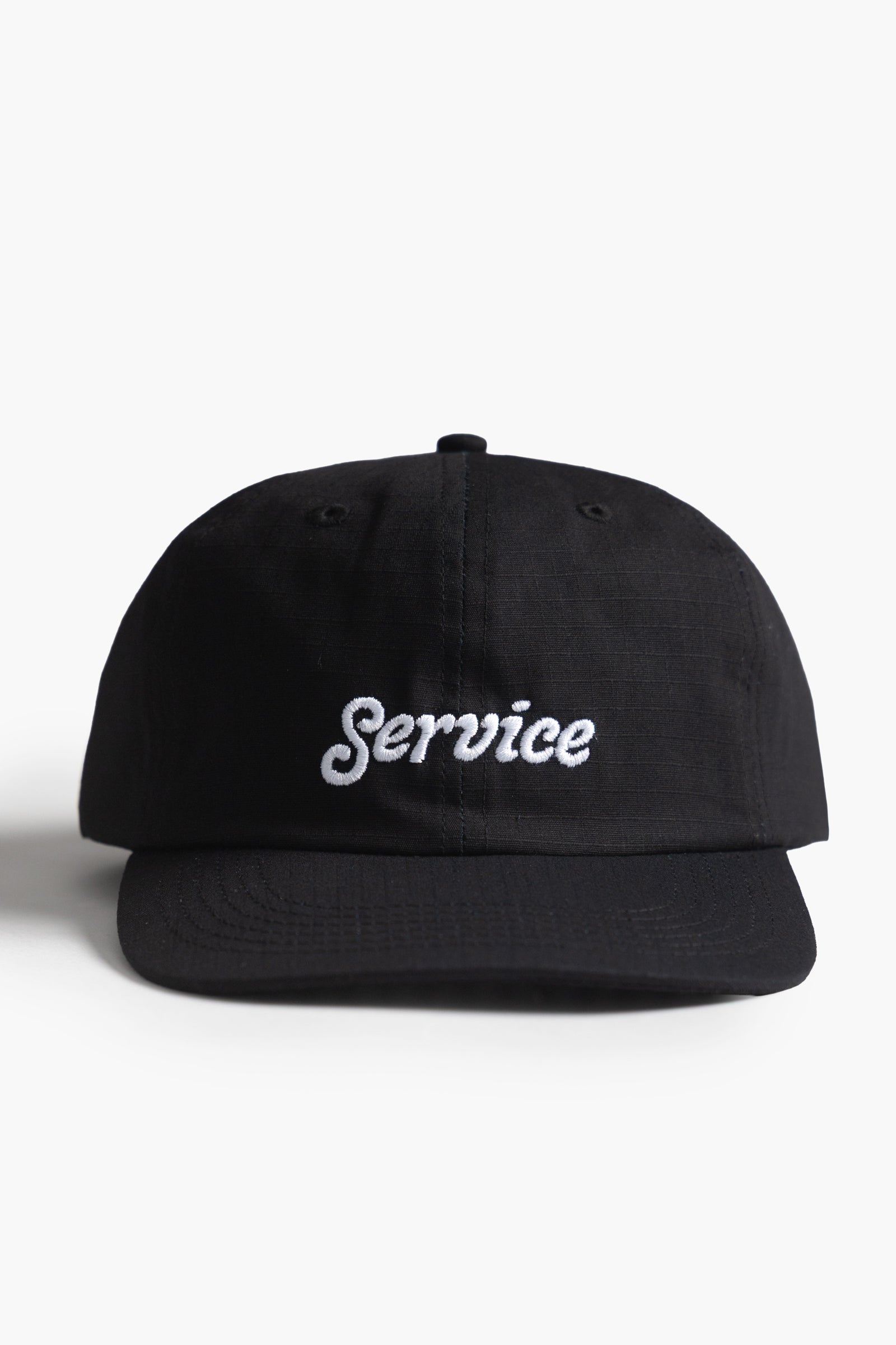 Side view of Ripstop Service Cap in black made from durable cotton ripstop fabric with structured fit and curved brim