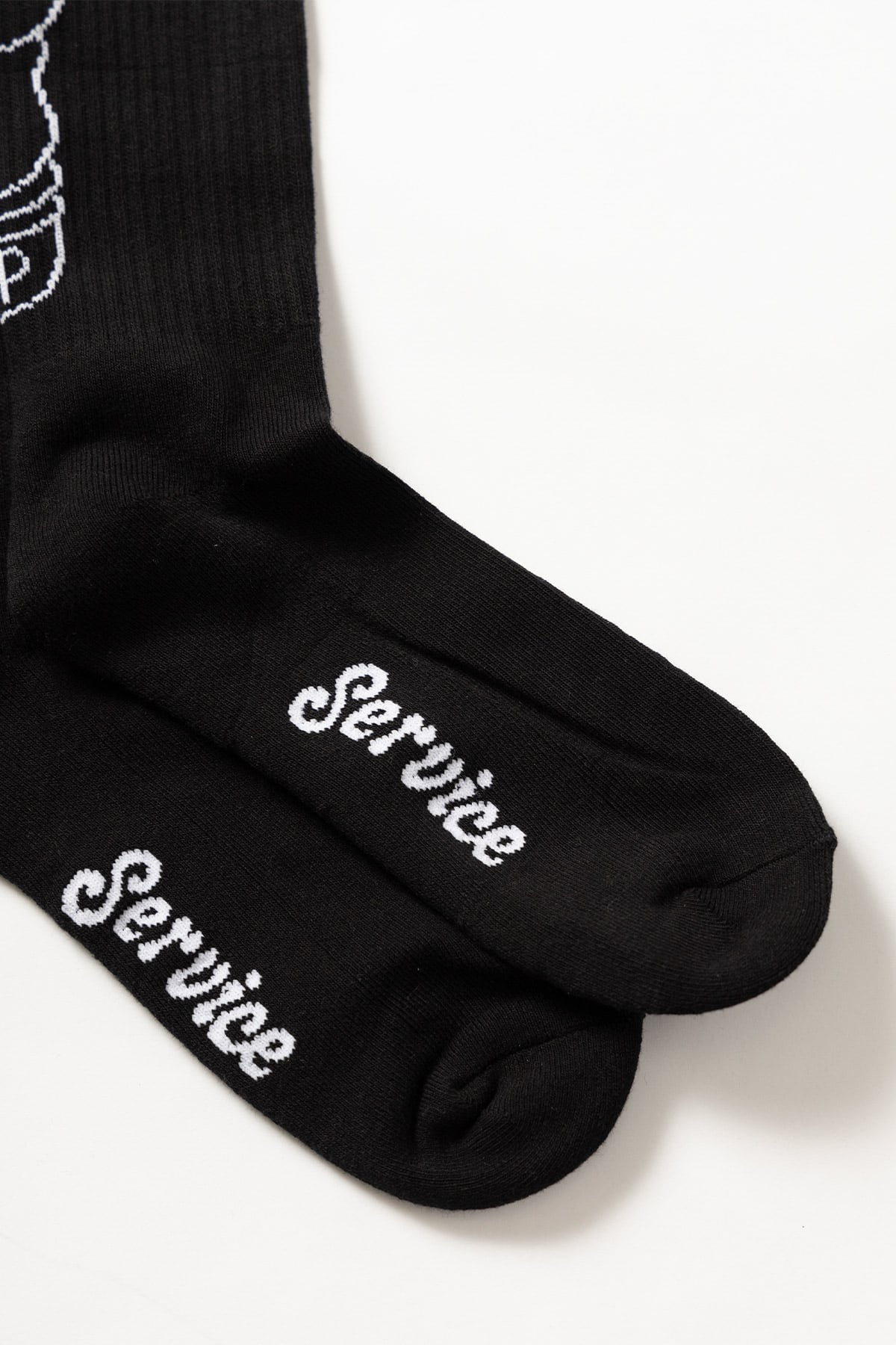 Black Salt + Pepper crew socks by Service Works, graphic detail and side view