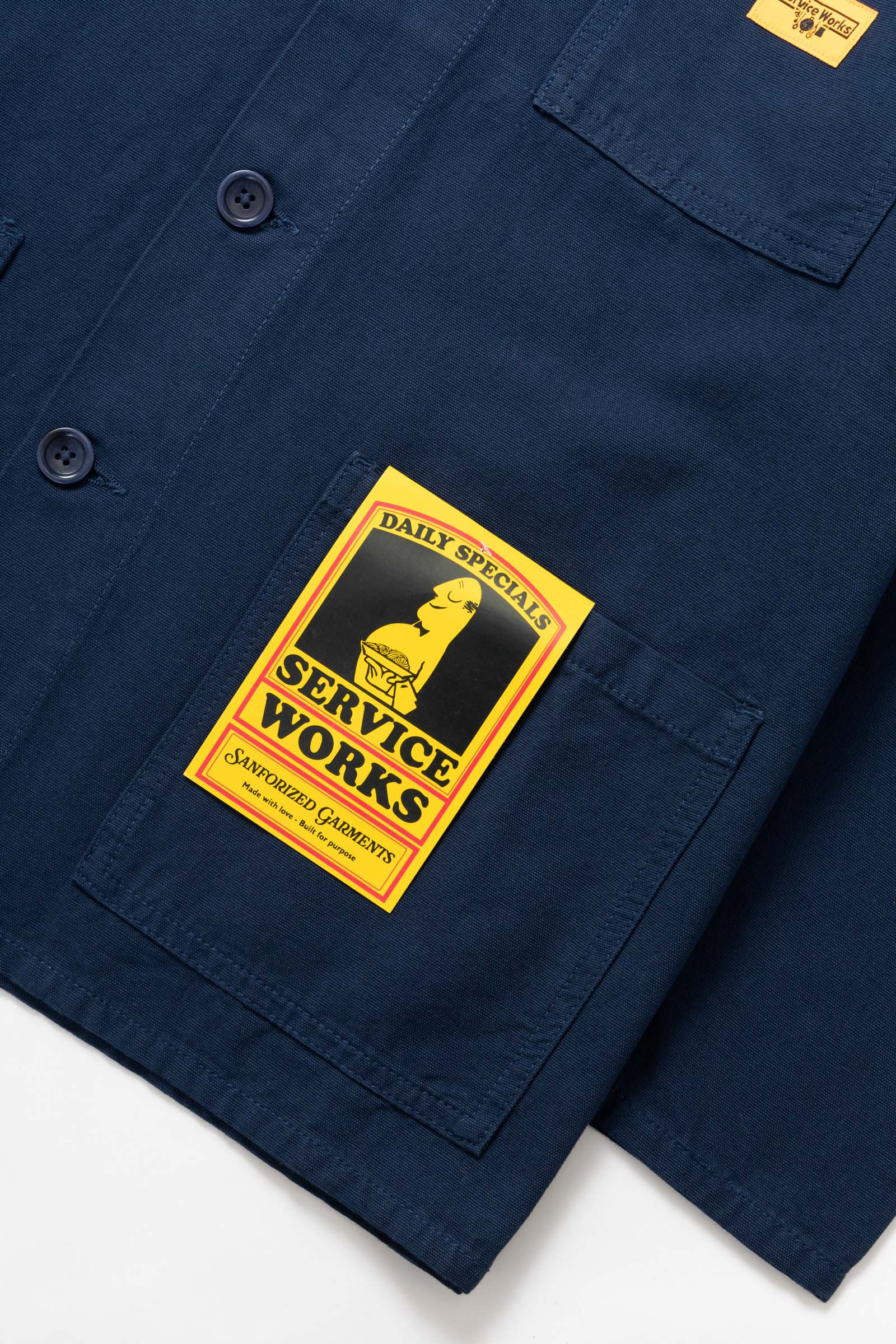 Back view of the Service Works Canvas Chore Shirt in Navy with clean workwear design and structured canvas construction.