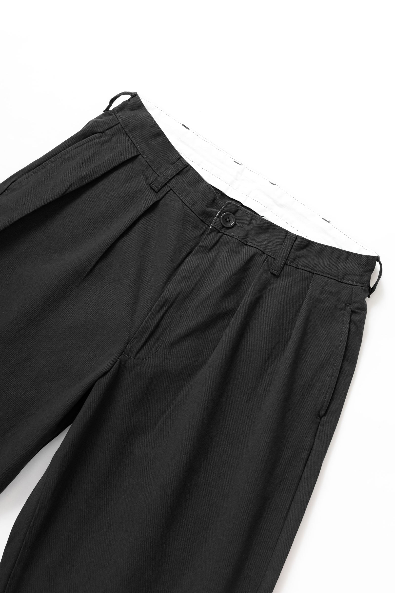 Side view of the Service Works Drill Part Timer Pant in Black showing balloon fit silhouette and relaxed drape.