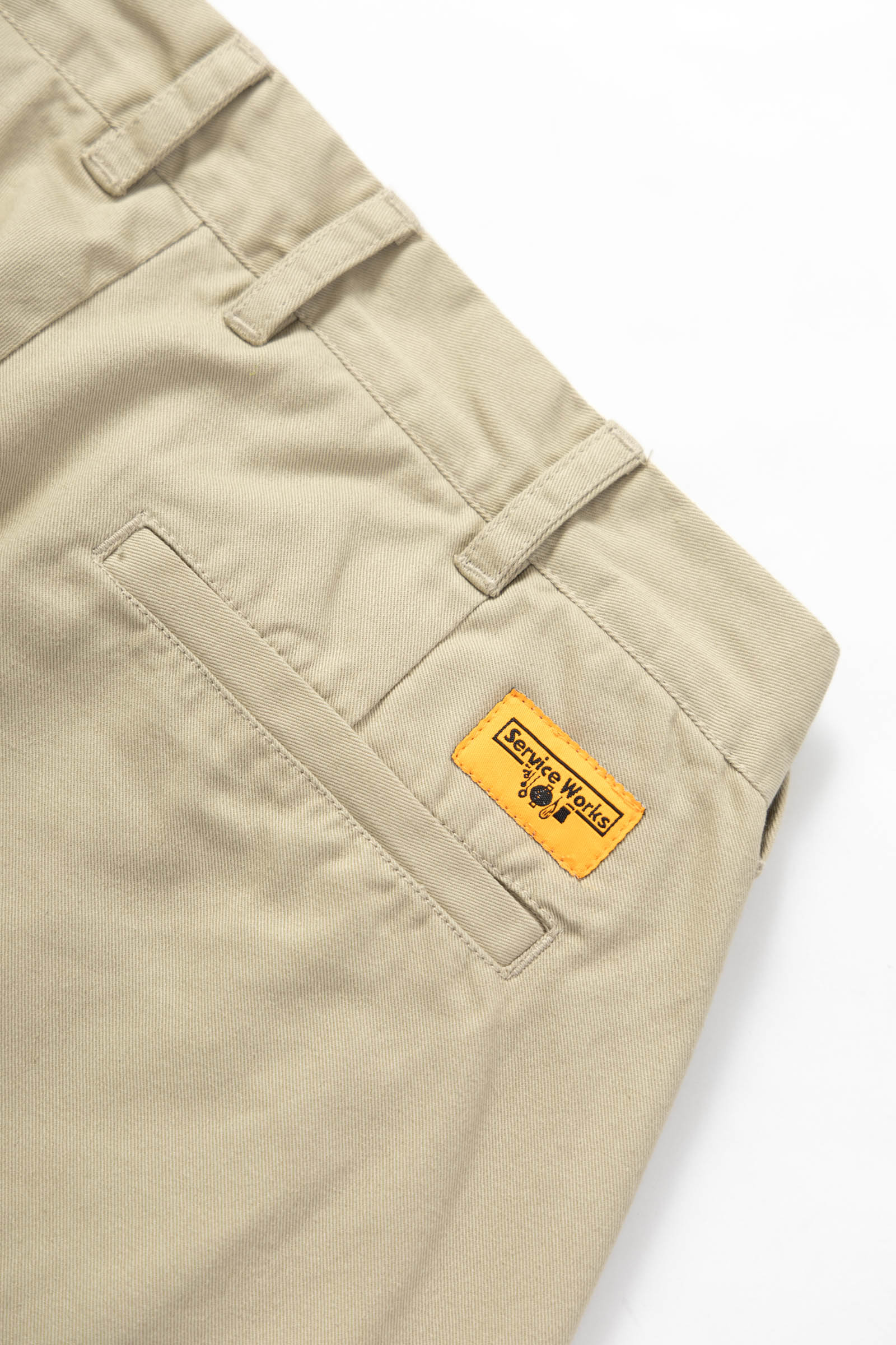 Service Works Drill Part Timer shorts in khaki showing branded label detail on workwear shorts