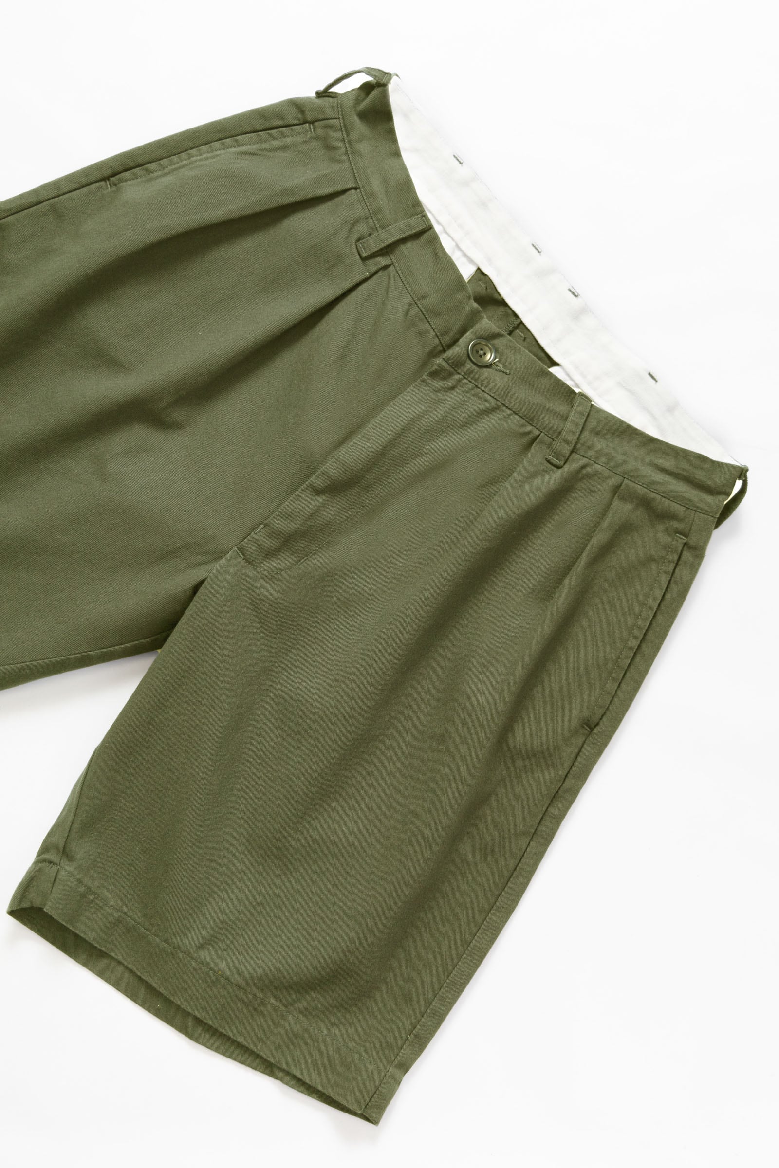 Service Works Drill Part Timer shorts in olive flat lay showing pleated workwear design front view