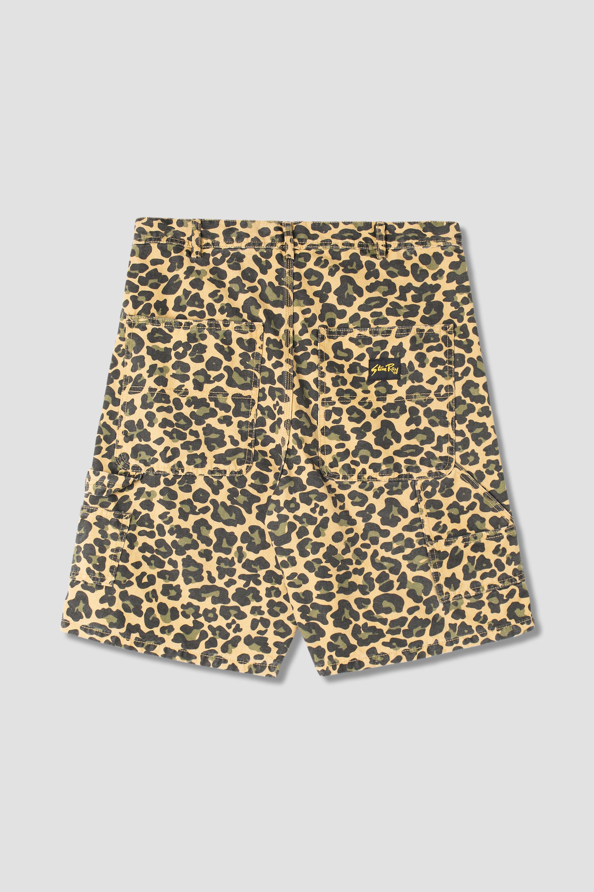 Back view of model wearing Stan Ray Big Job Short Leopard Camo oversized painter shorts with utility pockets and relaxed fit for everyday wear.