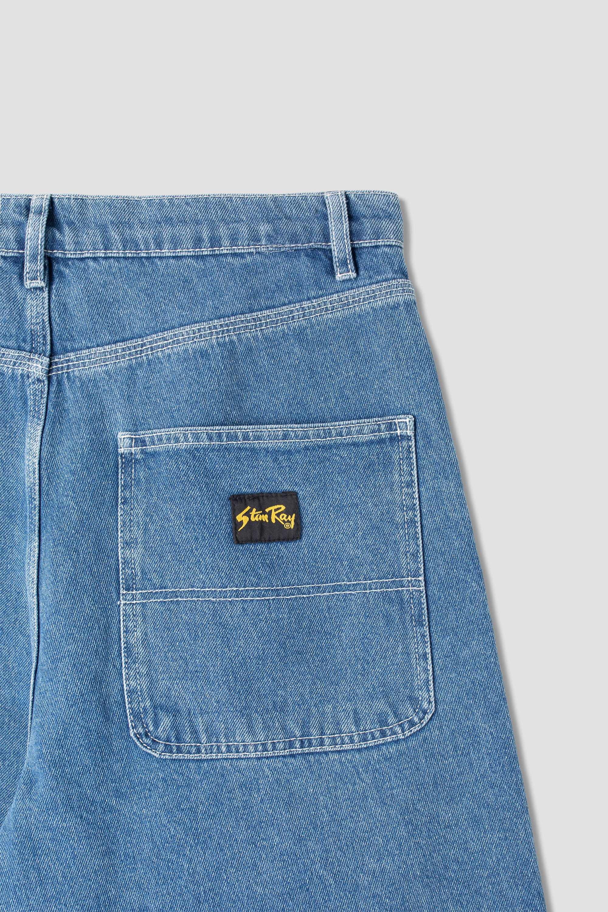 Close-up detail of Stan Ray Wide 5 Short Mid Stone Denim showing heavyweight cotton denim texture, stitching and durable construction.
