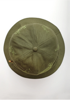 Olive 6-panel bucket hat by Service Works with embroidered branding and one-size fit