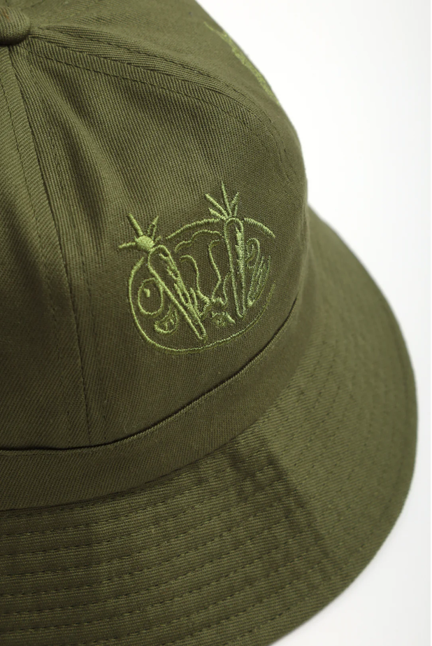 Service Works Mardi olive bucket hat showing embroidered details and woven tab label