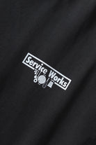 Black pigment dyed trademark tee back view premium vintage streetwear oversized fit washed cotton t-shirt