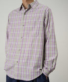 Men’s purple checkered ombre shirt styled on model, featuring 100% cotton fabric and a relaxed fit