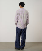 Men’s purple checkered ombre shirt styled on model, featuring breathable 100% cotton and a relaxed fit