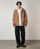 Model wearing Cliff Pant Black relaxed fit utility pants in stretch twill fabric for everyday wear and street style