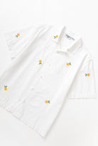 White cross stitch shirt side view premium cotton urban streetwear relaxed fit shirt
