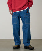 Model wearing Denim EQT Pant in Light Wash
