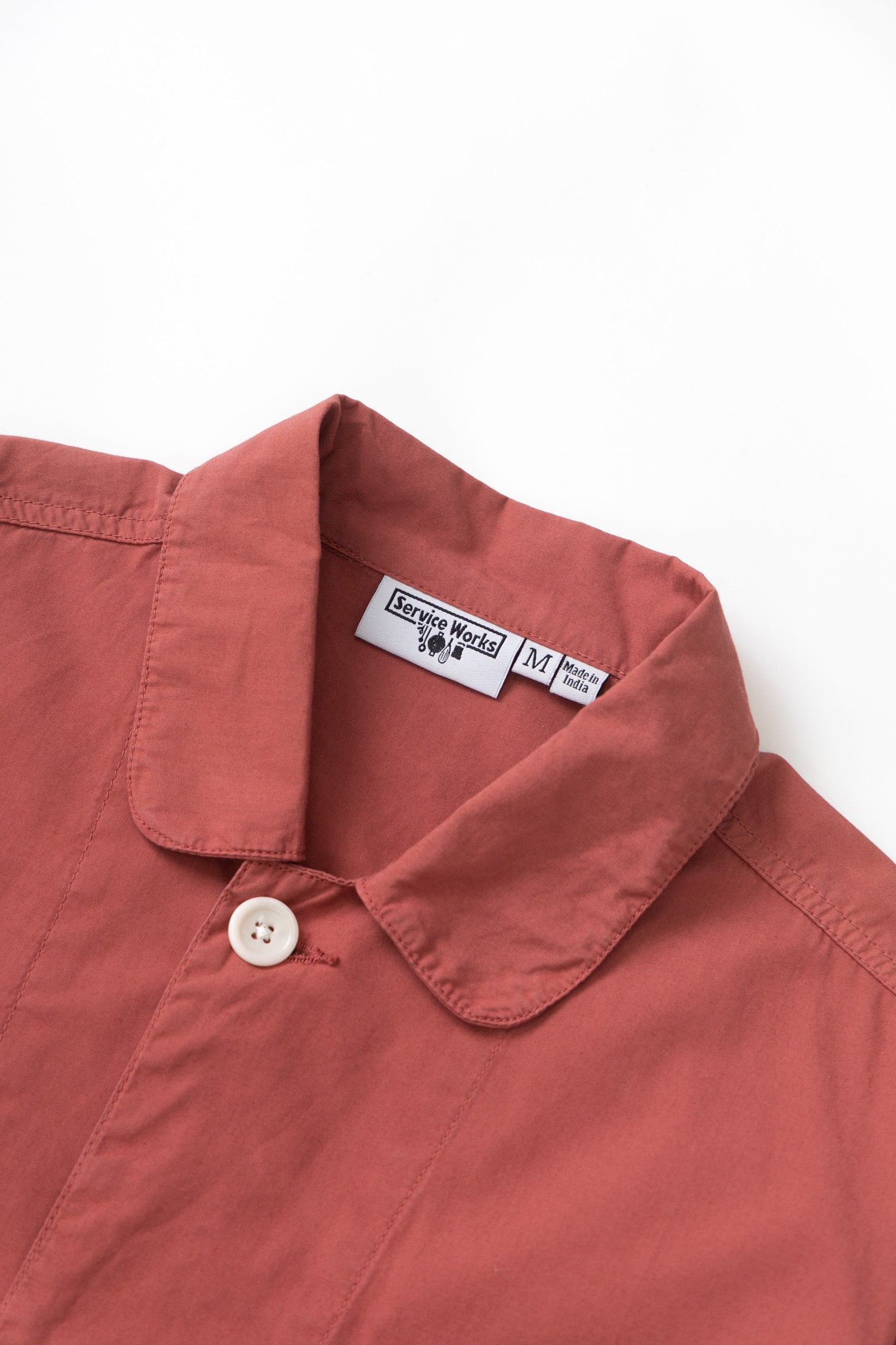Model wearing clay chef overshirt in organic cotton lifestyle view