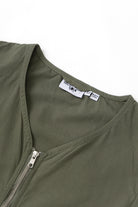 Olive utility vest pocket detail in organic cotton with YKK hardware