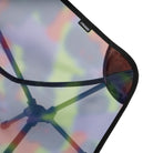 Angled view of Gramicci & Helinox Chair One in camo showing lightweight frame construction and tie-dyed mesh fabric design