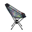 Angled view of Gramicci & Helinox Chair One in camo featuring lightweight portable frame and tie-dyed mesh fabric design