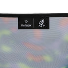 Lifestyle view of Gramicci & Helinox Chair One in camo showing lightweight portable camping chair with tie-dyed mesh fabric design