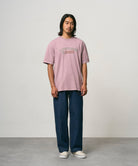 Model wearing Gramicci Livin Tee Lilac Pigment relaxed fit cotton T-shirt