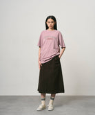 Woman wearing Gramicci Livin Tee Lilac Pigment premium cotton T-shirt