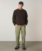 Model wearing Cactus Pigment Gramicci cotton pants relaxed utility fit