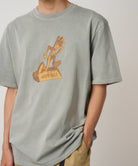 Gramicci Sculpture Tee in Grey Pigment worn on model showing relaxed streetwear fit side view