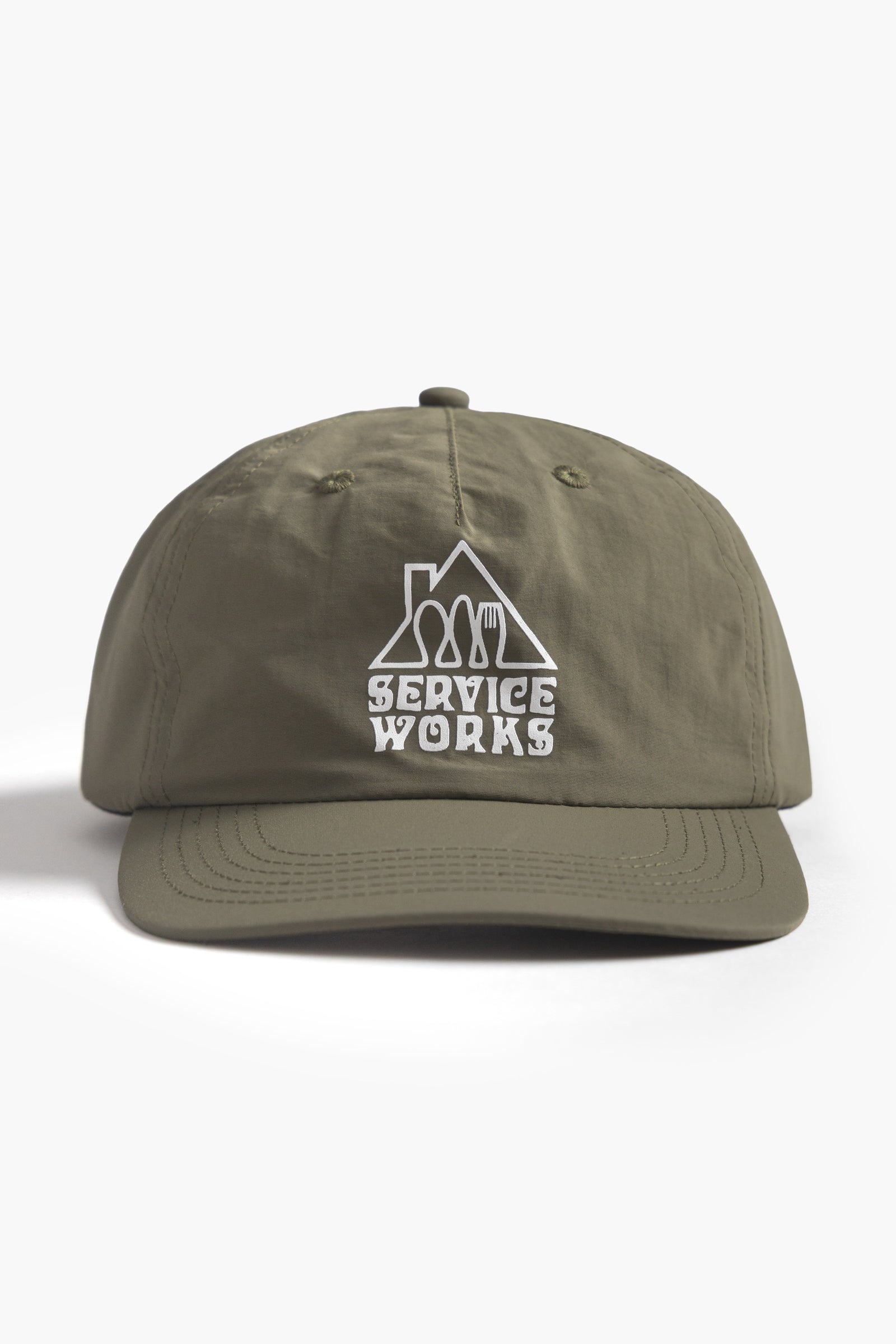 Olive green cotton cap front detail view with Home Comforts design