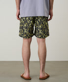 LE.SHOP Nylon Reef Shorts Olive Camo utility swim shorts worn side view on model fit streetwear styling