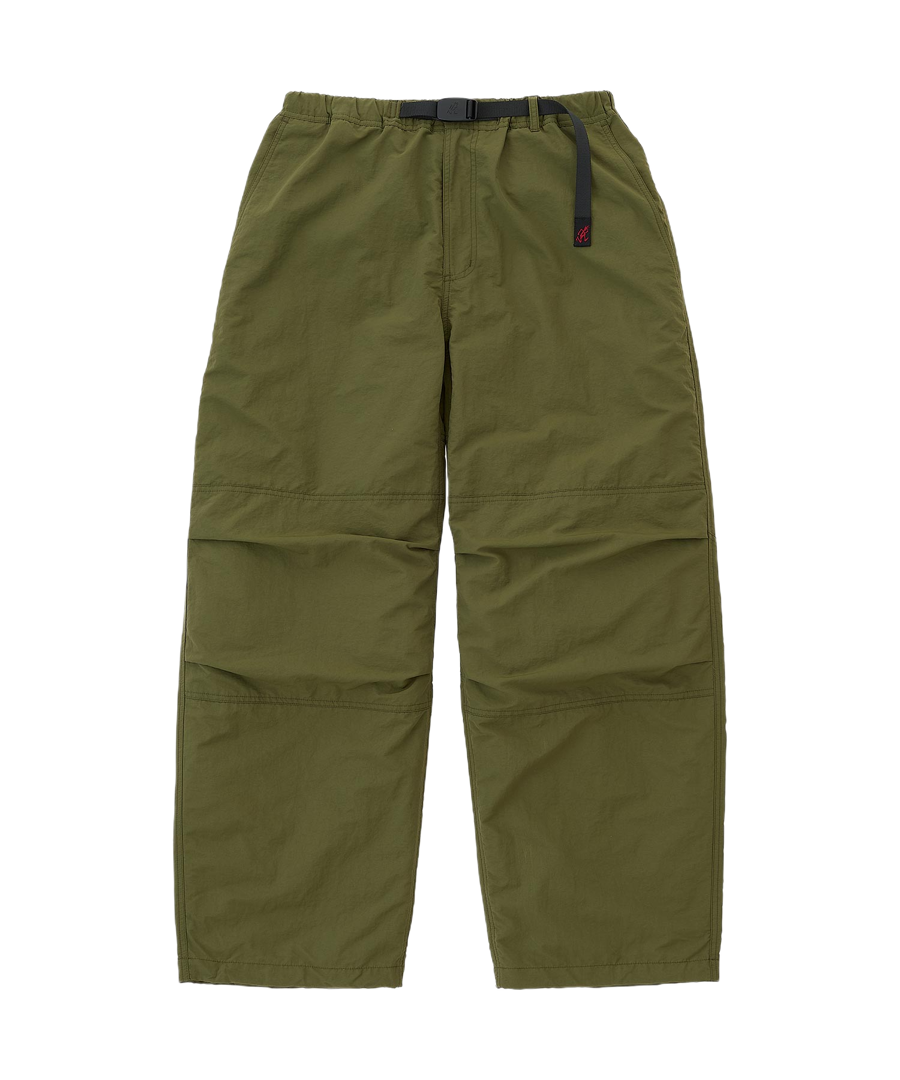 Olive nylon paneled trek pants with wide-leg fit and elastic waistband, durable lightweight utility trousers front view