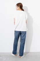 Ordinary Fits relaxed fit Type Loose jeans styled on-body against white wall