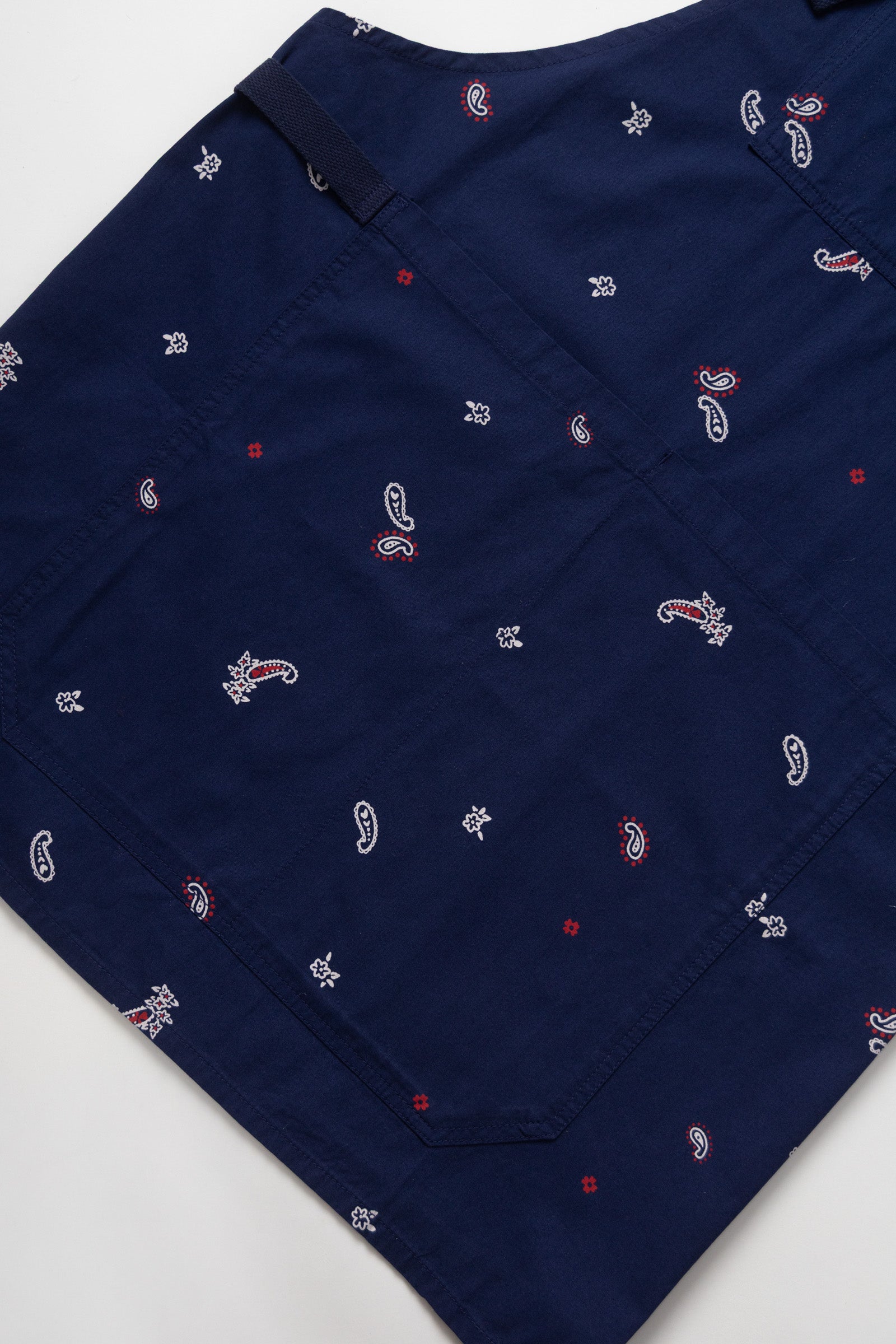 Royal paisley apron side view premium workwear apron for chefs baristas and creatives durable cotton design