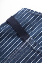 Indigo pinstripe denim apron front detail premium workwear cooking barista workshop design