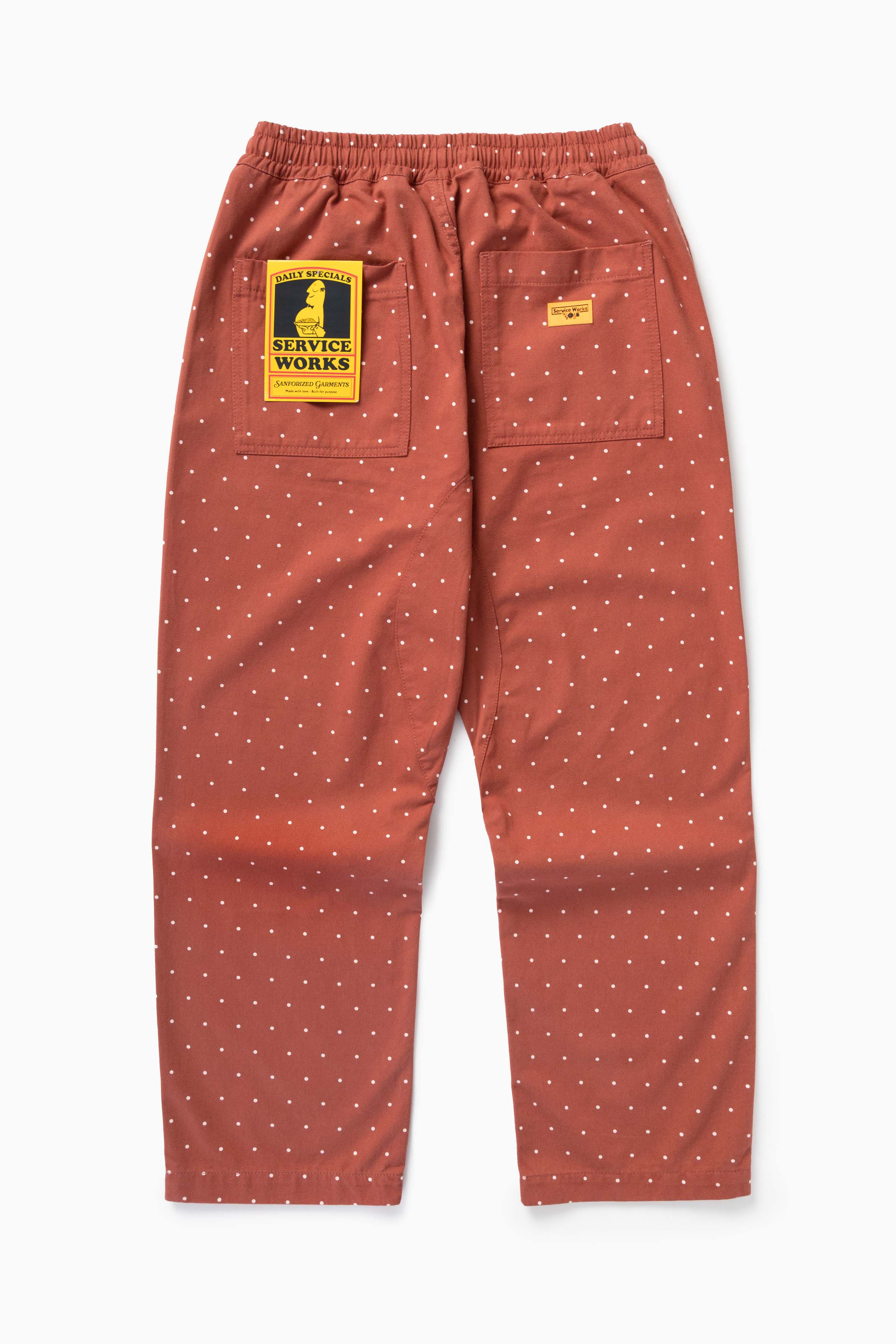 Model wearing clay Polka Dot Chef Pants in relaxed fit, featuring organic cotton fabric and versatile workwear-inspired streetwear styling