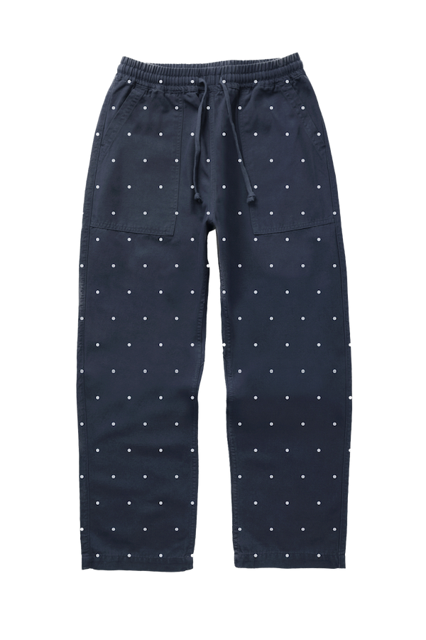 Navy Polka Dot Chef Pants featuring organic cotton fabric, relaxed silhouette and functional workwear-inspired pocket construction front view