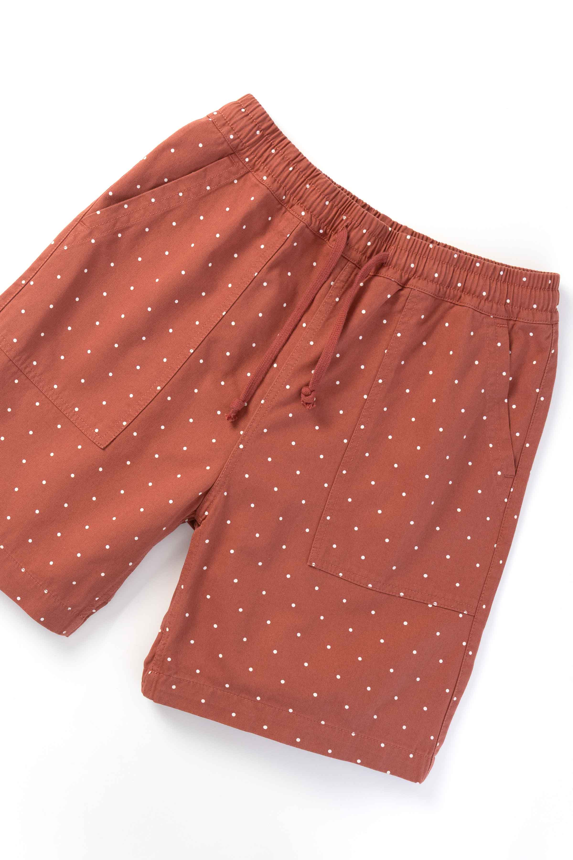 Front view of model wearing clay chef shorts with organic cotton fabric, relaxed silhouette and functional utility pockets for casual and streetwear use