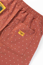 Lifestyle view of clay chef shorts worn in casual streetwear style, featuring organic cotton fabric, relaxed silhouette and functional utility pocket design