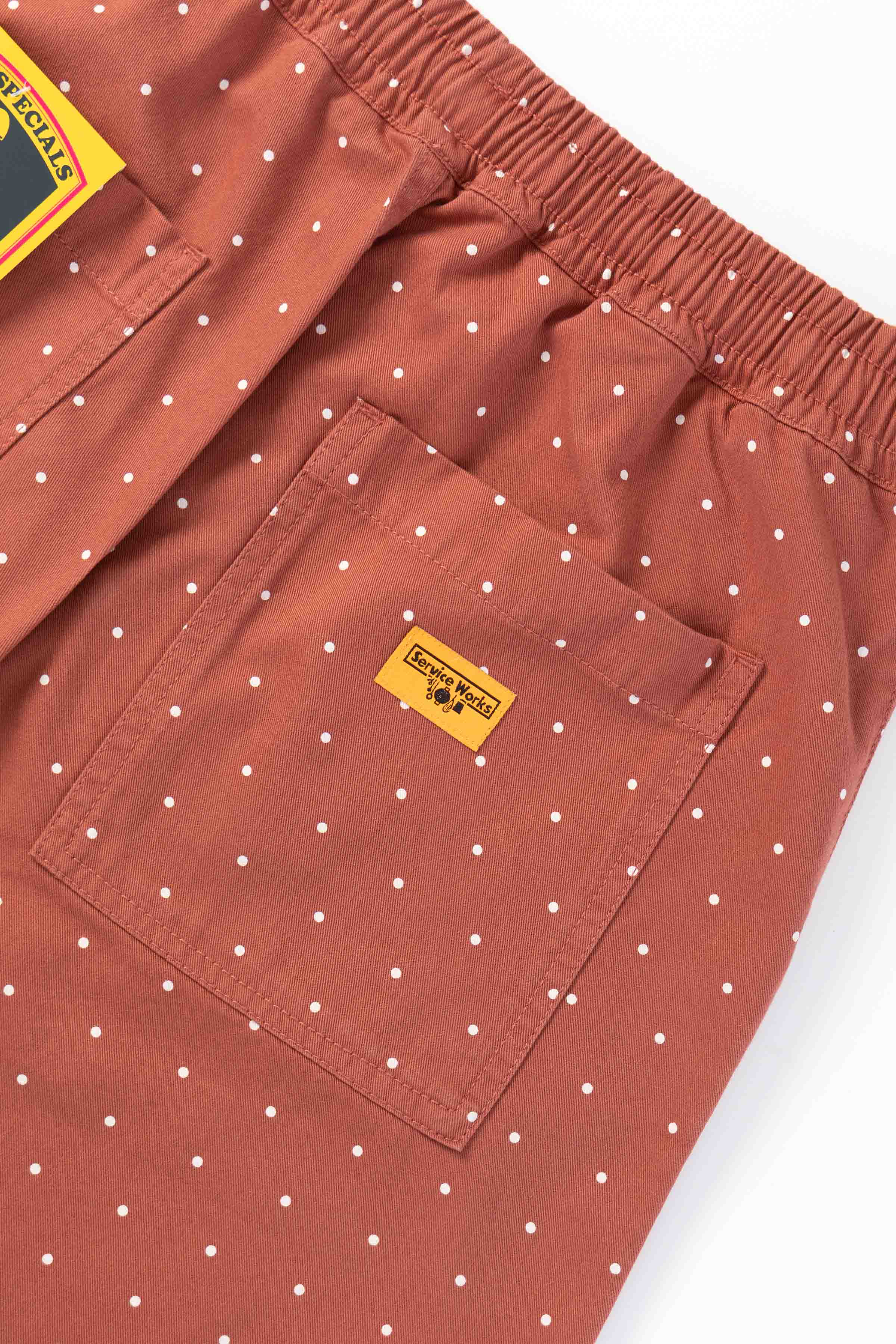Lifestyle view of clay chef shorts worn in casual streetwear style, featuring organic cotton fabric, relaxed silhouette and functional utility pocket design
