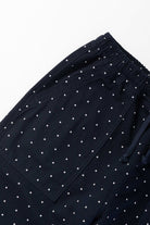 Model wearing navy Polka Dot Chef Shorts shown from side angle featuring organic cotton fabric, relaxed silhouette and functional workwear design