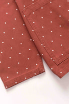 Lifestyle image of clay Polka Dot Chore Shirt featuring organic cotton fabric, relaxed workwear fit and versatile everyday styling