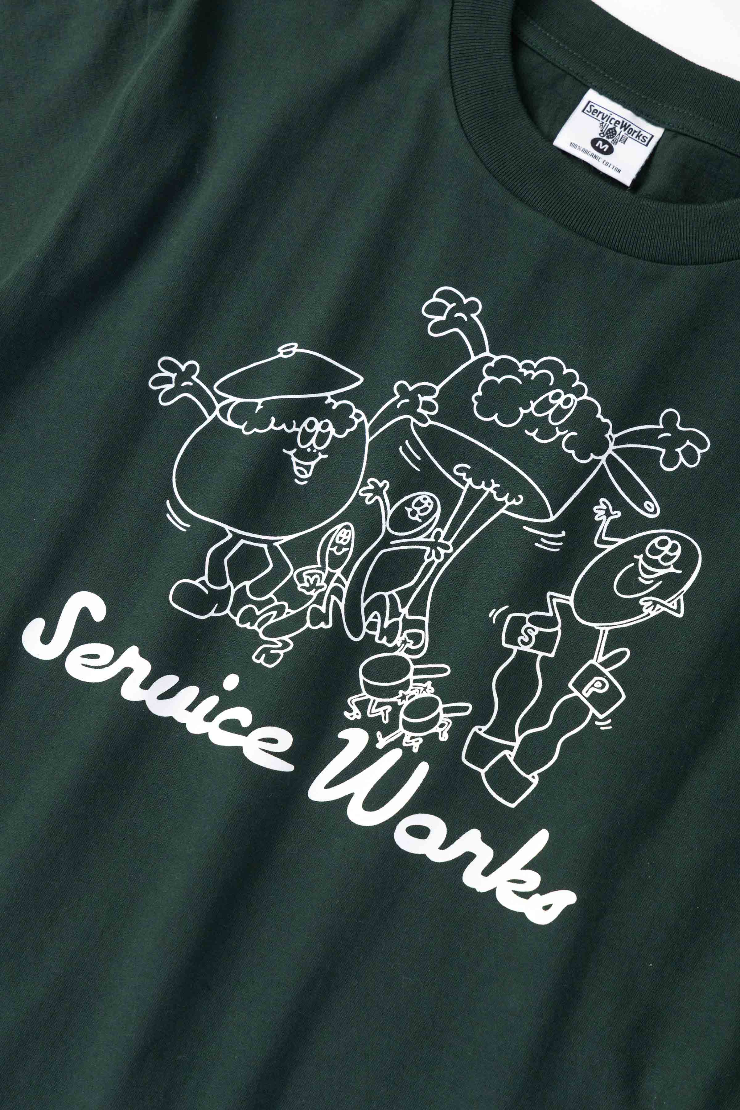 Model wearing forest Pots & Pans Tee shown from side angle featuring organic cotton fabric, clean silhouette and relaxed casual fit
