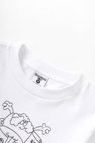 Side view of model wearing Pots & Pans Tee in white made from 250 GSM GOTS organic cotton with standard fit and midweight fabric