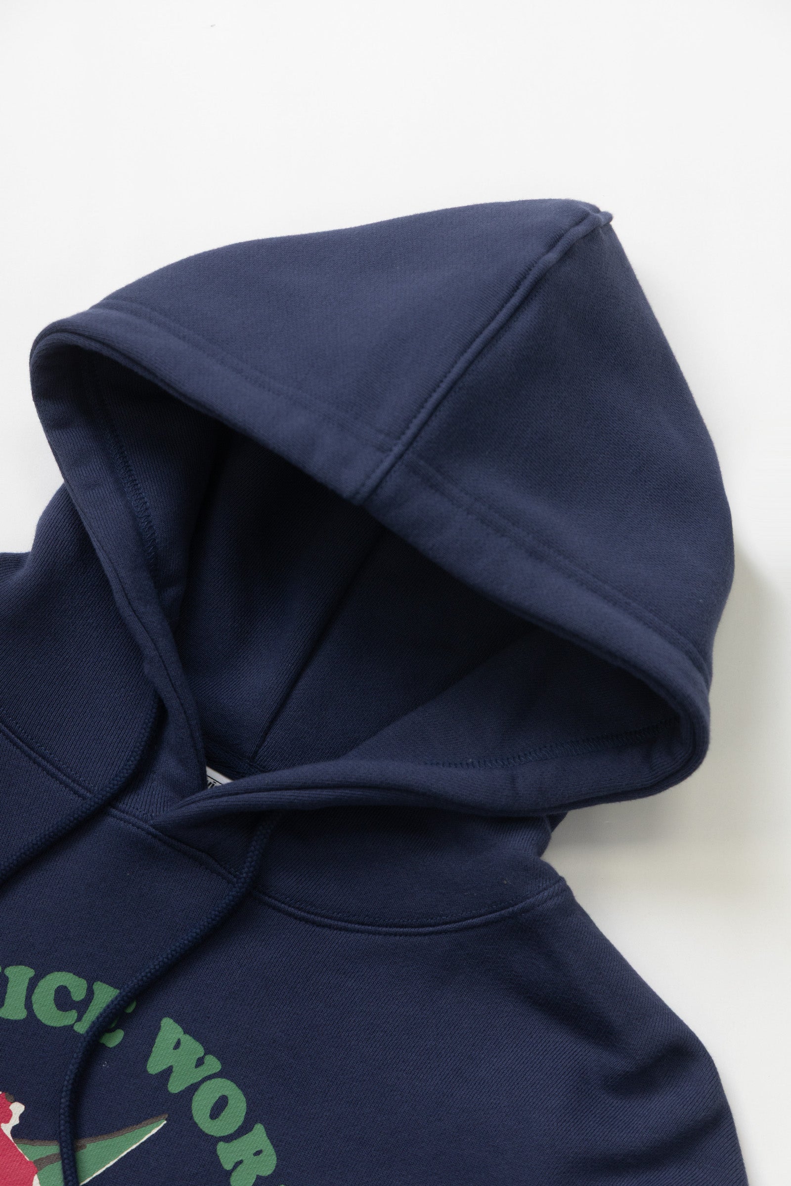 LE.SHOP Radish Hoodie Navy streetwear hoodie worn in lifestyle setting